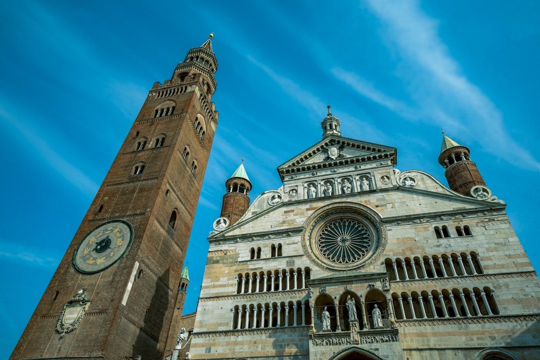 a tall tower with a clock on the top of it